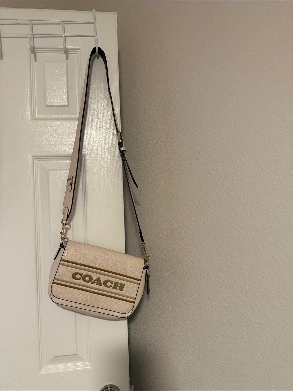 COACH Pale Pink Leather Crossbody with Gold Logo Stripe